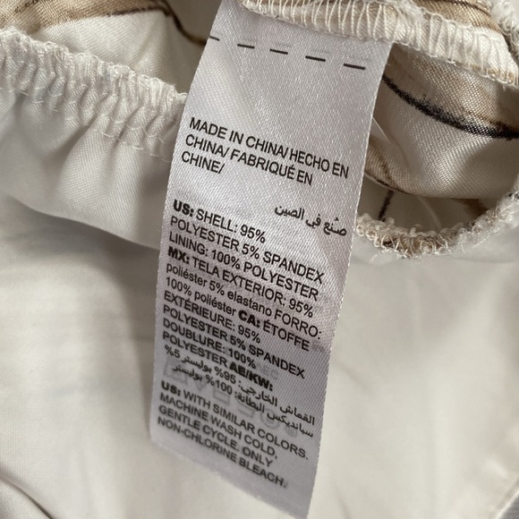 White House Black Market silky peplum blouse. - Picture 8 of 14